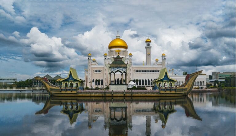 Brunei Tours a boat that is sitting in the water
