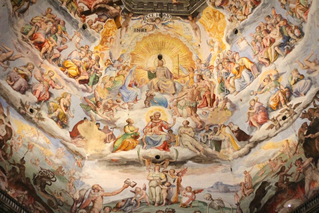 Sistine Chapel Travel Guide a painting on the ceiling of a building