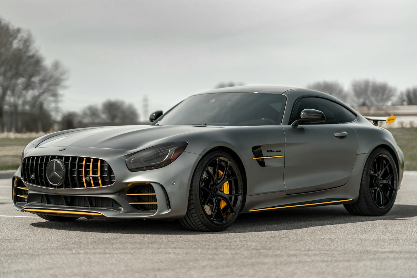 car rentals economybookings black mercedes benz coupe on gray asphalt road
