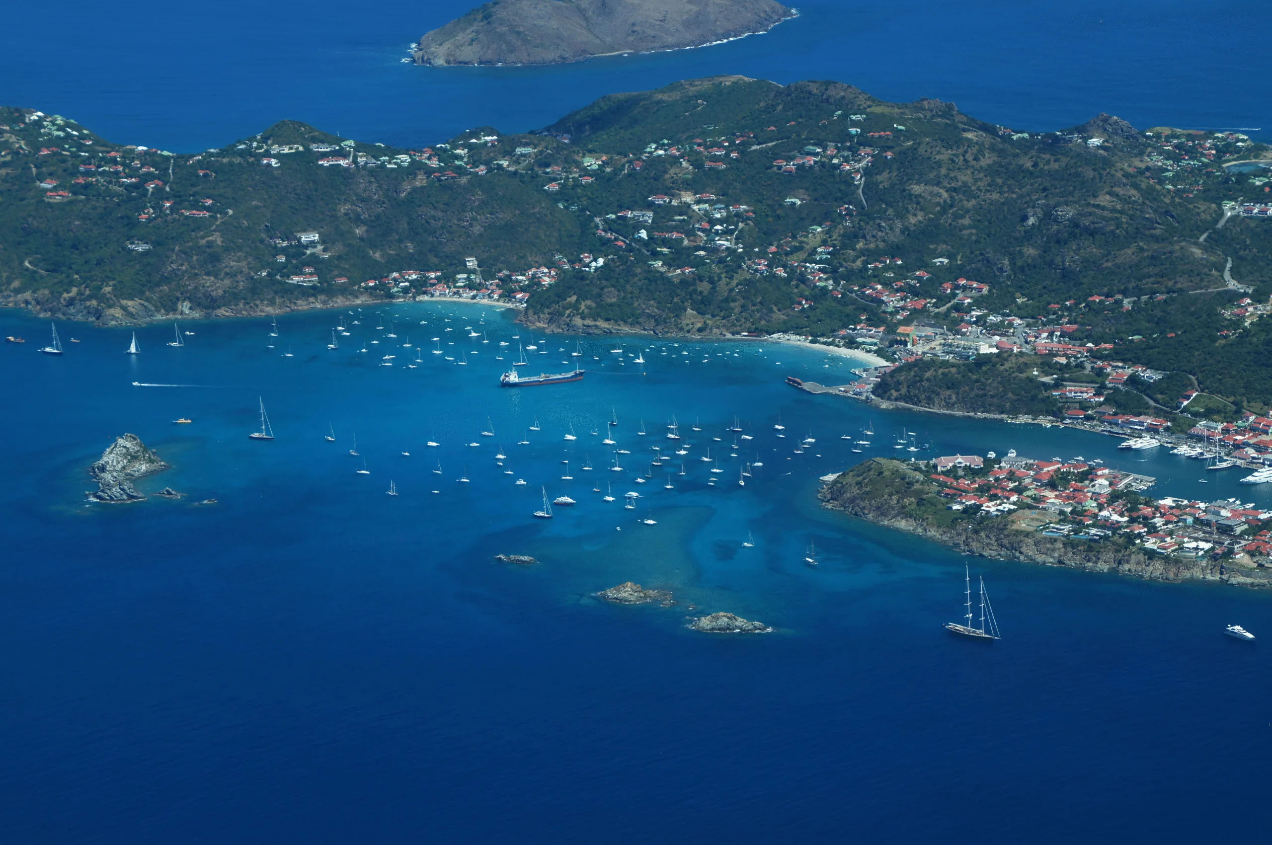St Kitts and Nevis Tours an aerial view of a small island with boats in the water