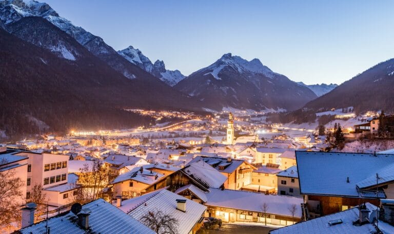 Austria Tours white concrete houses near mountain