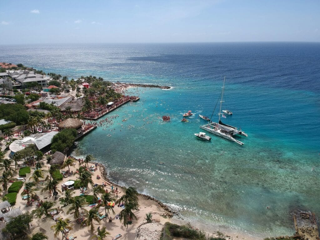Curacao Tours aerial view of white boat on sea during daytime