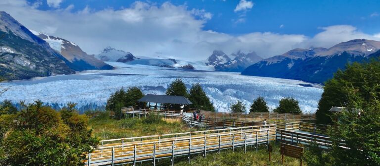Argentina Travel Guide a group of people standing on top of a lush green hillside