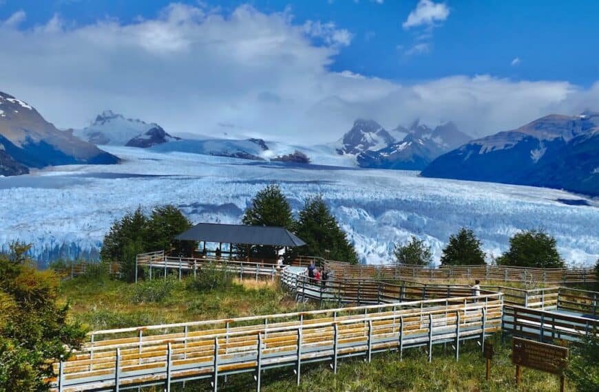 Argentina Travel Guide a group of people standing on top of a lush green hillside