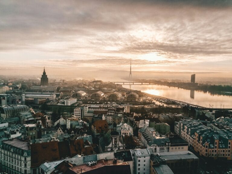 Latvia Travel Guide aerial photo of city under cloudy sky