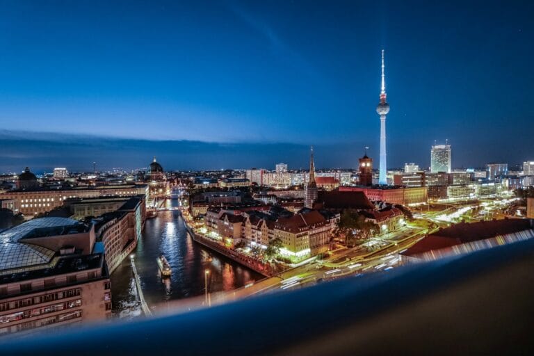 Berlin Travel Guide city buildings during night time