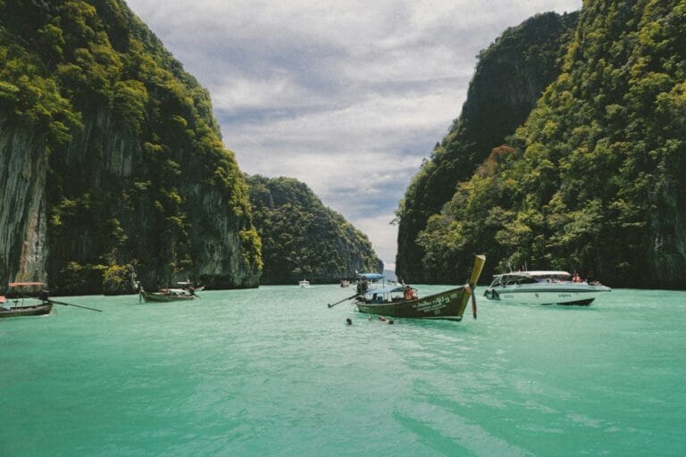 vietnam travel guide four wooden boat on teal sea