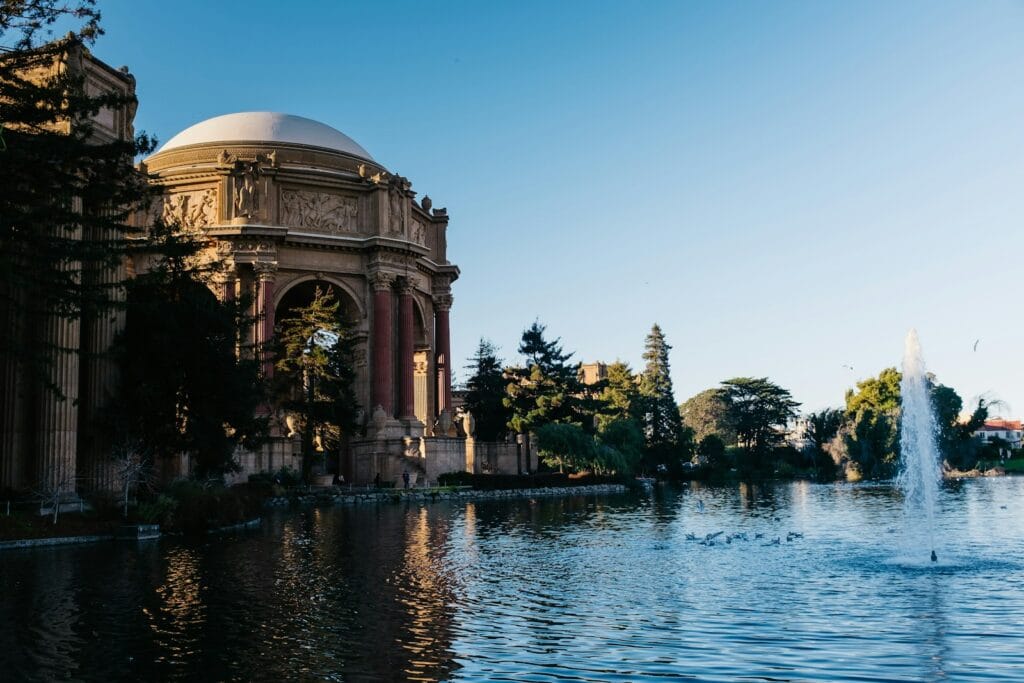 San Francisco Travel Guide white concrete building near body of water during daytime