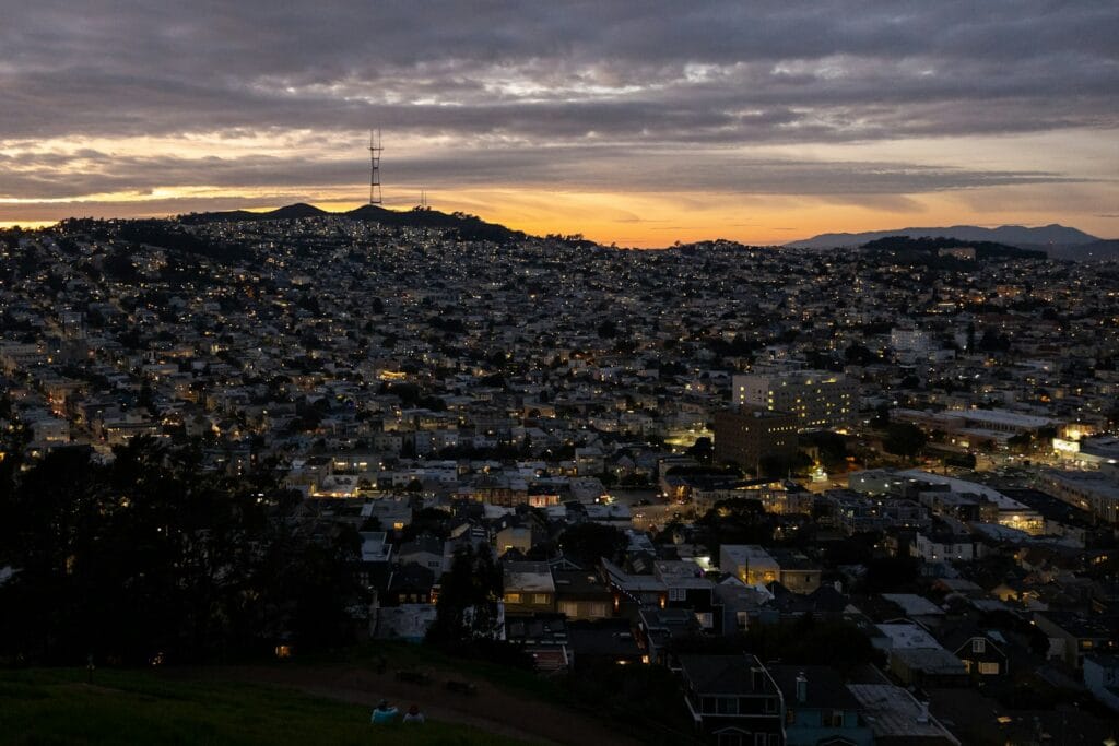 San Francisco Travel Guide a view of a city at sunset
