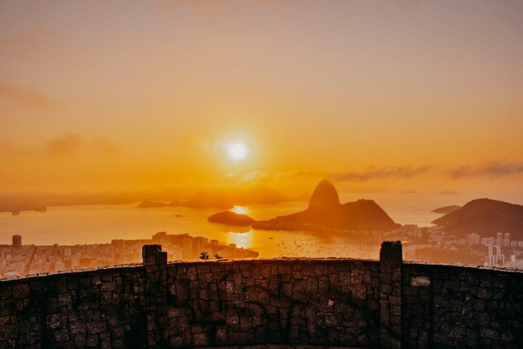 Rio de Janeiro Travel Guide, silhouette of people on top of building during sunset