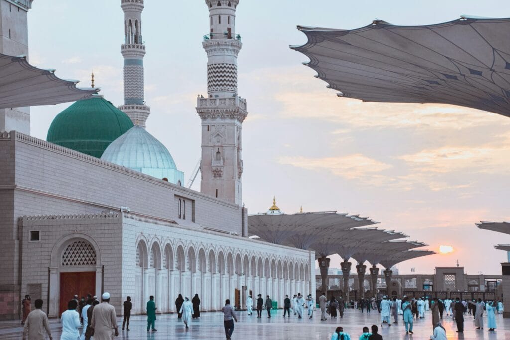 Masjid Nabawi and Sunrise  Madinah Saudi Arabia white concrete building under blue sky during daytime
