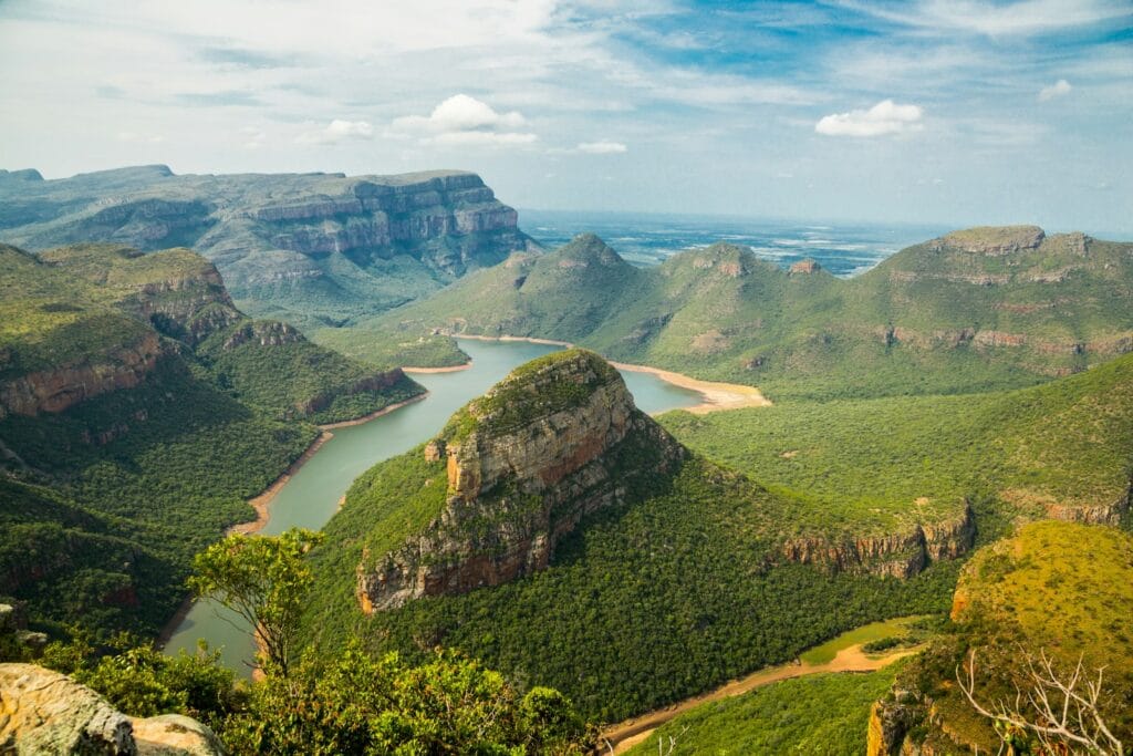 South Africa Tours landscape photography of mountains under blue sky