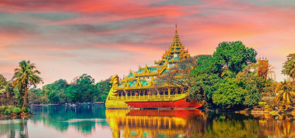 Myanmar Travel Guide: A Timeless Journey into Southeast Asia red boat near mosque painting