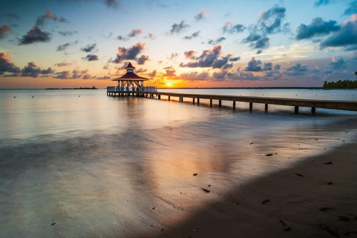 dominican republic tours a pier that is sitting in the water