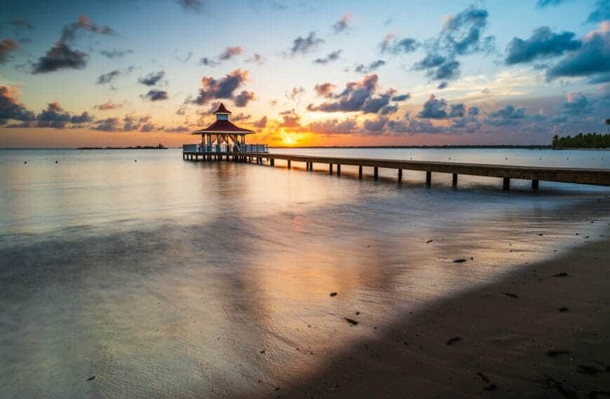 dominican republic tours a pier that is sitting in the water