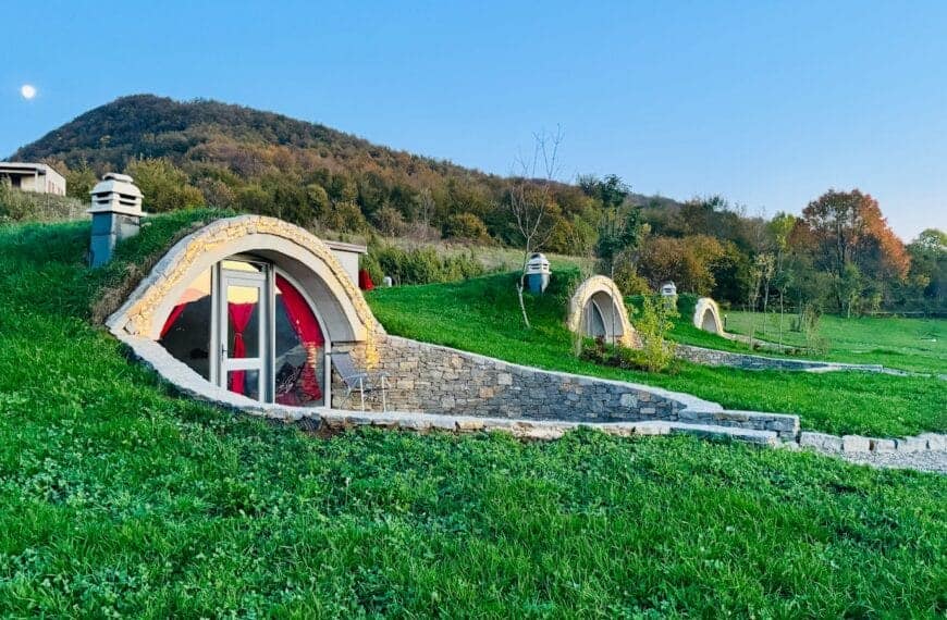 Kosovo Travel Guide A house made out of grass with a red door