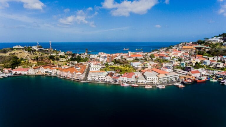 Grenada Travel Guide an aerial view of a city by the ocean