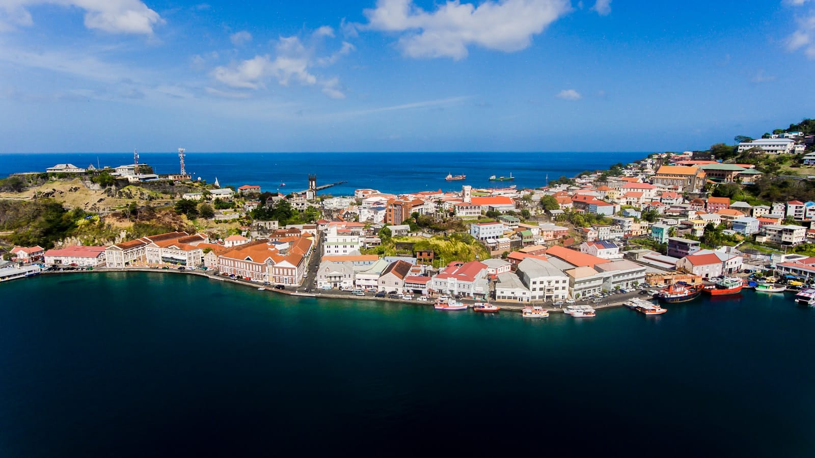 Grenada Travel Guide an aerial view of a city by the ocean