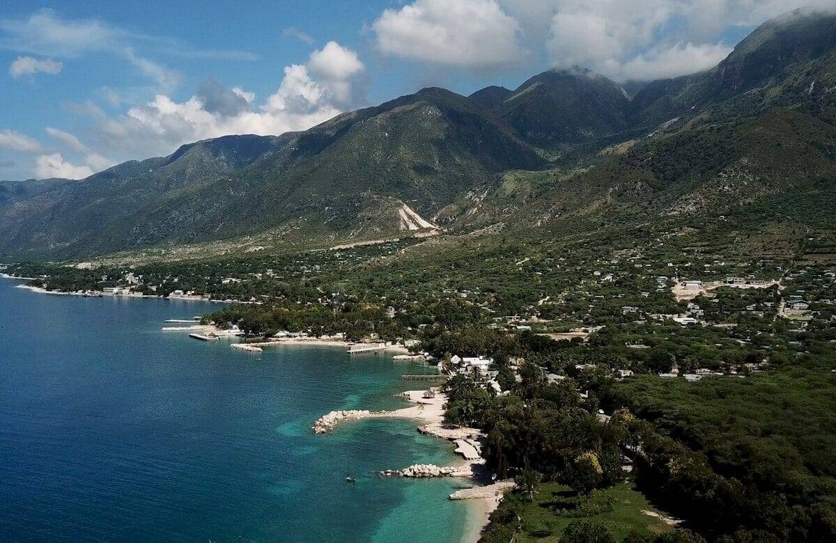 Haiti Tours town at the foot of mountain by the sea