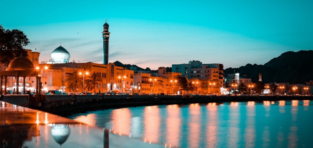 Oman Travel Guide city skyline during night time