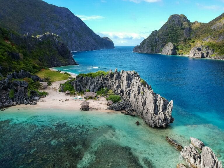 Philippines Tours aerial photo of body of water between mountains