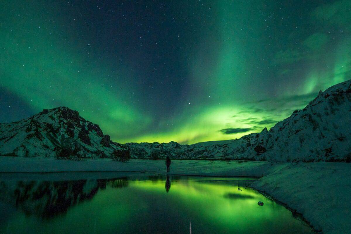 Iceland Tours snow mountain with Aurora borealis