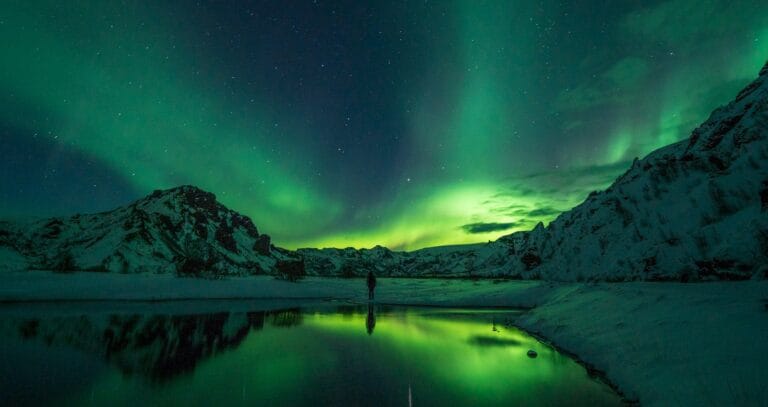 Iceland Tours snow mountain with Aurora borealis