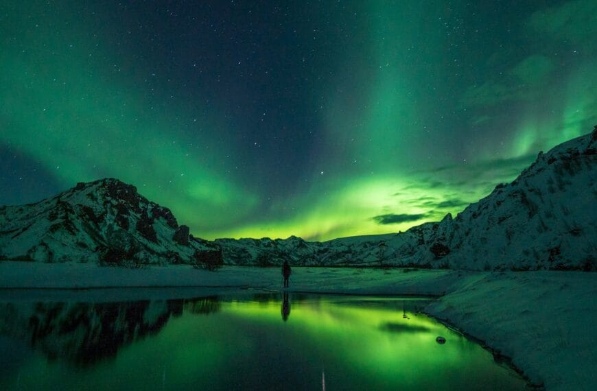 Iceland Tours snow mountain with Aurora borealis