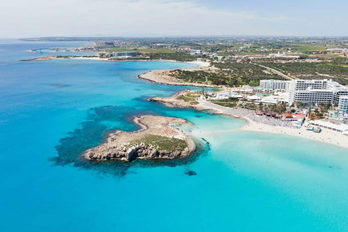Cyprus Travel Guide aerial view of city buildings near body of water during daytime