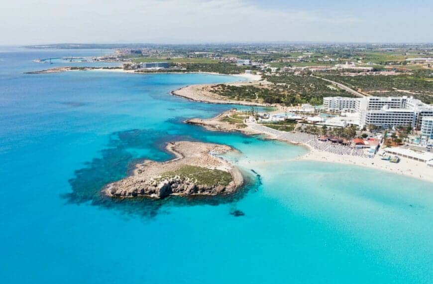 Cyprus Travel Guide aerial view of city buildings near body of water during daytime