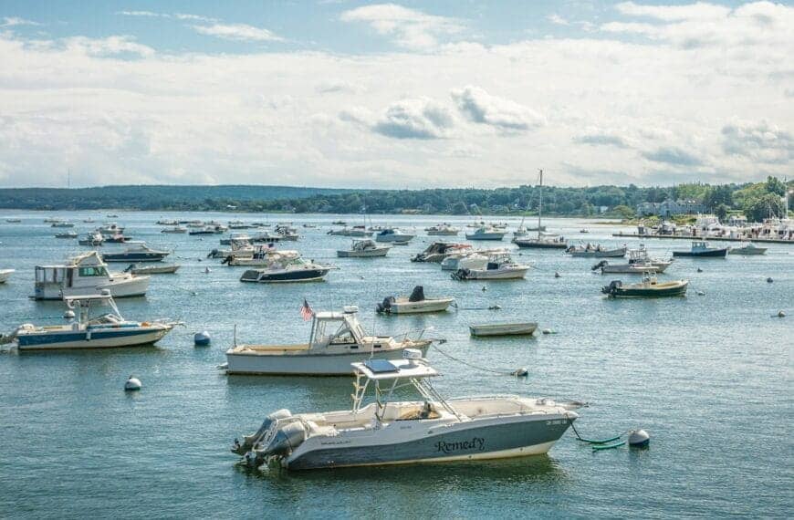 Montserrat Tour white and blue boat on sea under blue sky during daytime