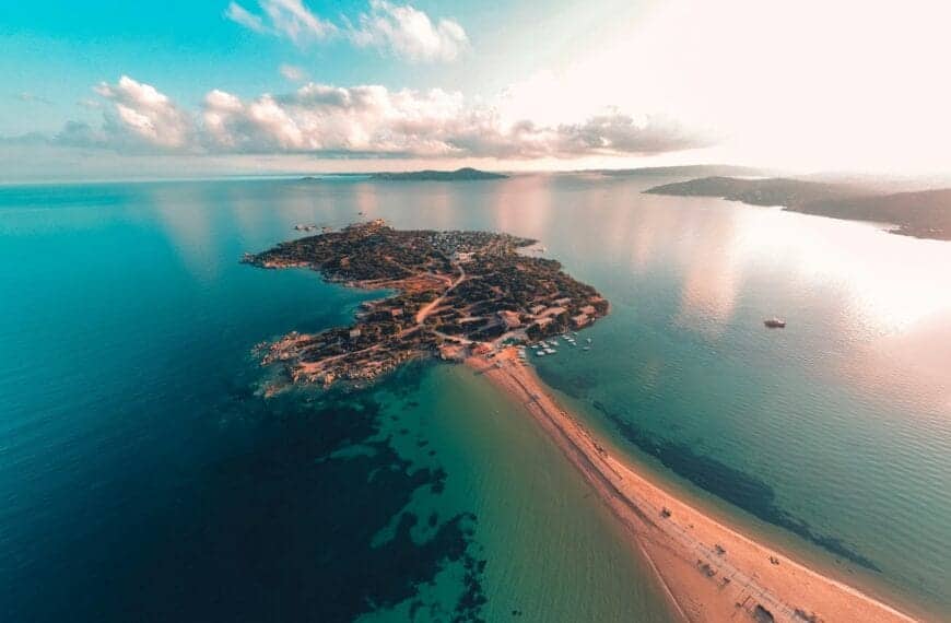 Sardinia Travel Guide an aerial view of a beach and a body of water