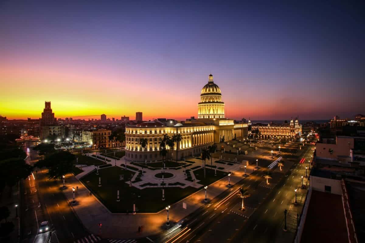 Cuba travel guide white and black dome building during sunset