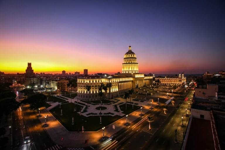Cuba travel guide white and black dome building during sunset