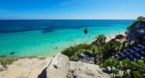 Riviera Maya Tours green palm trees on white sand beach during daytime