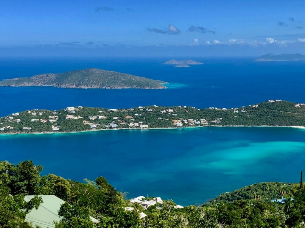 US Virgin Islands Tours: Crystal Waters & Island Escapes Await US Virgin Islands Tours green trees near blue body of water during daytime