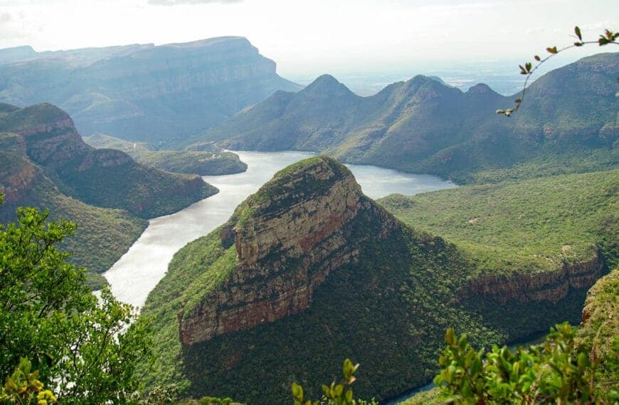 Southern Africa Travel Guide green and brown mountain beside body of water during daytime