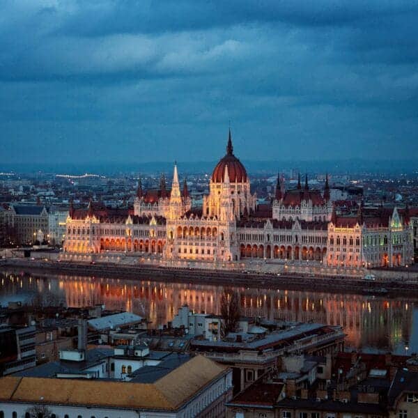 Budapest Travel Guide brown and white concrete building during night time