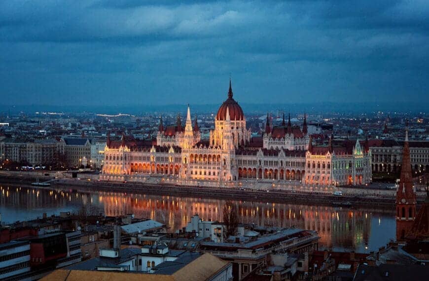 Budapest Travel Guide brown and white concrete building during night time