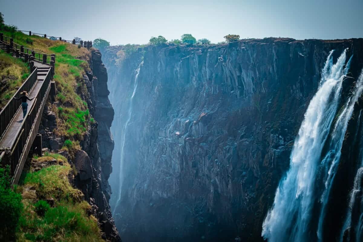 Zambia Travel Guide a large waterfall with Victoria Falls National Park