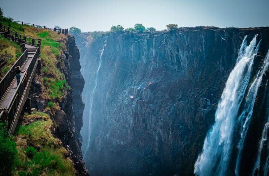 Zambia Travel Guide a large waterfall with Victoria Falls National Park