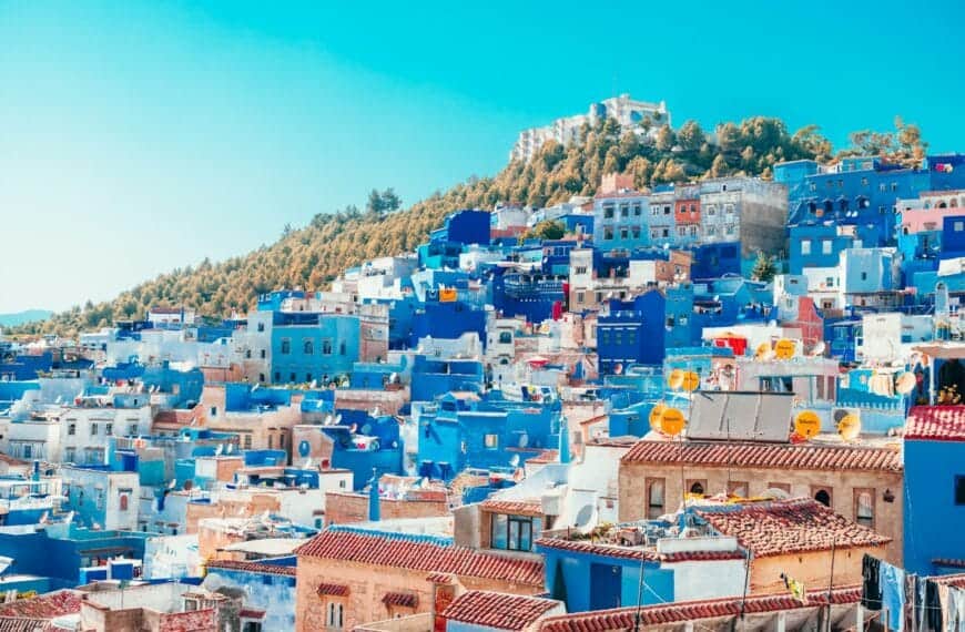 Morocco Tours blue and white painted houses on the cliff