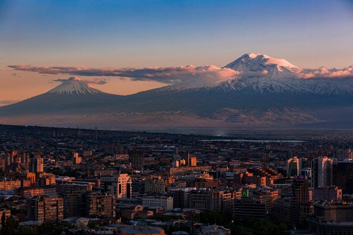 Armenia Travel Guide a view of a city with a mountain in the background