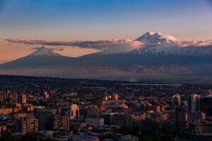 Armenia Travel Guide a view of a city with a mountain in the background