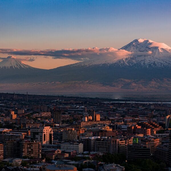 Armenia Travel Guide a view of a city with a mountain in the background