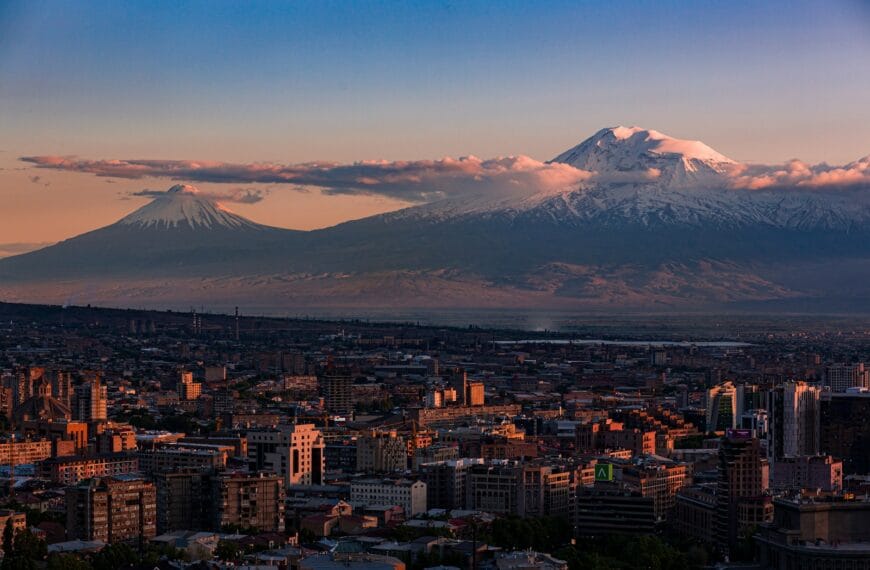 Armenia Travel Guide a view of a city with a mountain in the background