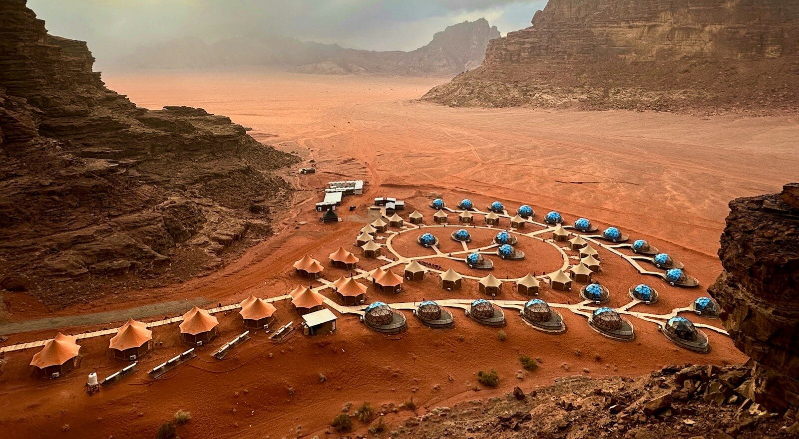 Jordan Tours a view of a desert with many tents in the middle of it