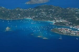 St Kitts and Nevis Tours an aerial view of a small island with boats in the water