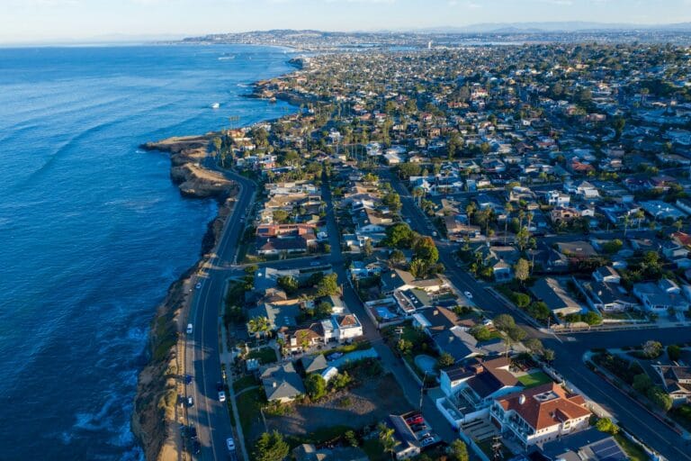 San Diego Travel Guide an aerial view of a city next to the ocean