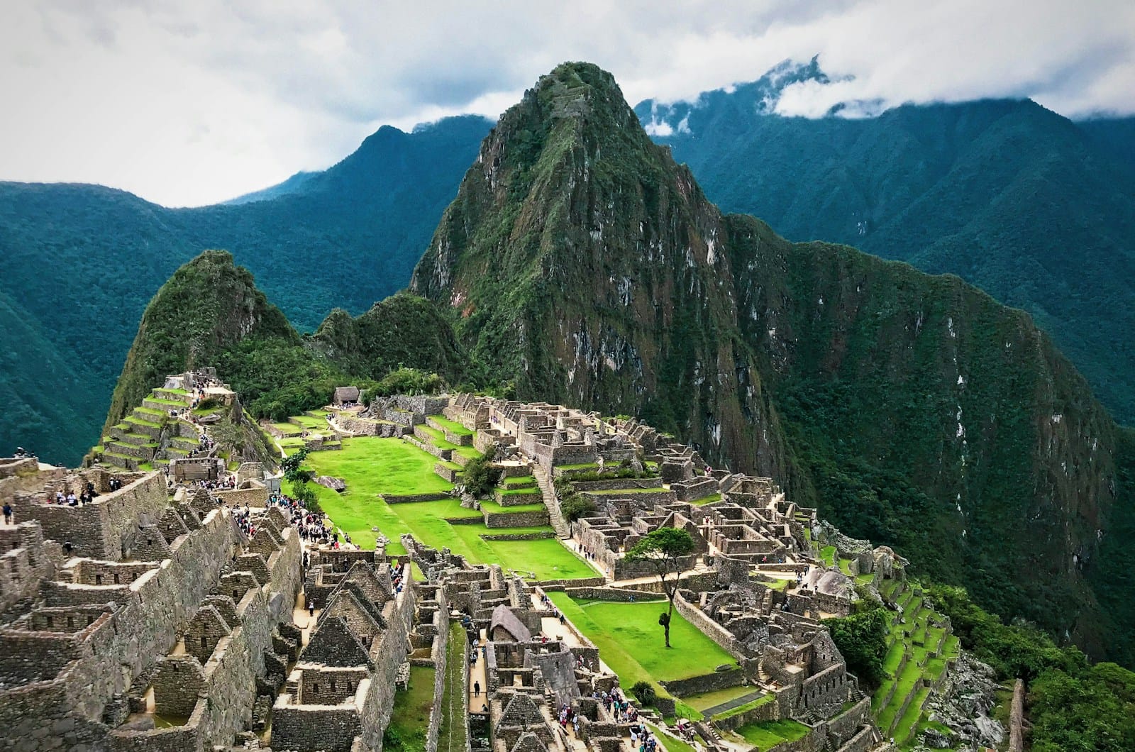 Machu Picchu Tours green and brown mountain under blue sky during daytime
